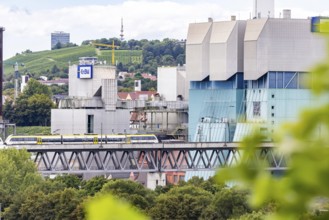 SWEG regional train travelling on the Schusterbahn, Münster viaduct with EnBW Energie