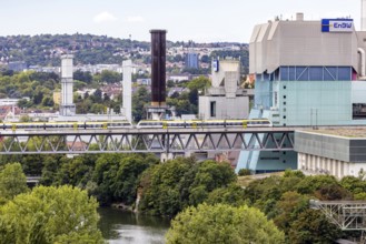 SWEG regional train travelling on the Schusterbahn, Münster viaduct over the Neckar with EnBW