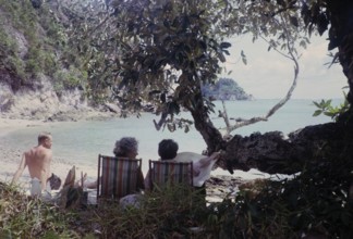 British expatriates enjoying leisure time in coastal bay sandy beach, photos of Singapore and Johor