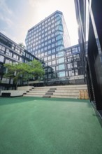 Inner courtyard with modern architecture and glass façade, urban design, Munich, Germany