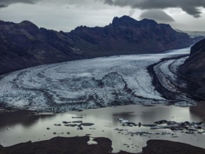 Glacier, glacier tongue, glacier lake, mountains, cloudy, aerial view, panorama, summer,
