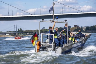 Multi-purpose boat of the THW during a training trip on the Rhine near Düsseldorf, the specialist