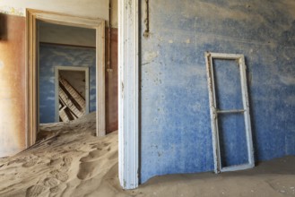 At Kolmanskop, the abandoned ghost town of the diamond days of the early 1900 and of German origin.