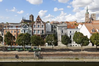 View from the Ozeaneum, below ferry canal, above row of houses, in the back left St. Mary's Church,