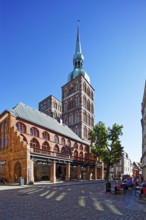 Rear towers St. Nikolai Church first mentioned in 1276, 102 metres high, in front town hall