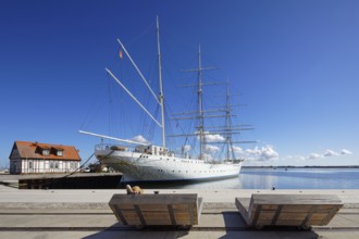 Woman with sun hat on a lounger, Gorch Fock, also Gorch Fock I, built in 1933 by Blohm & Voss for