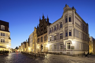 Night view, splendid town houses, building on the right neo-Renaissance, centre gabled house, brick