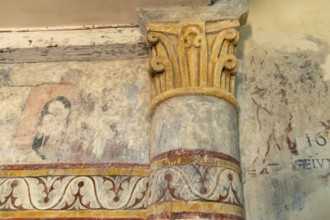 Saint Jean Chapel features ancient wall paintings showcasing religious figures with vibrant colors