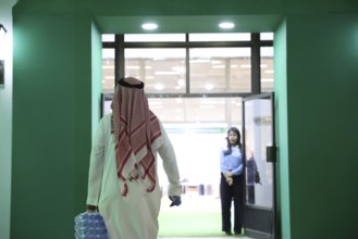 Saudi companies showcase products and investments inside the Saudi pavilion at the Damascus