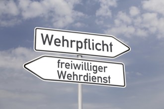 (Photomontage) Directional arrows pointing in the directions of MANDATORY DEFENCE and VOLUNTARY