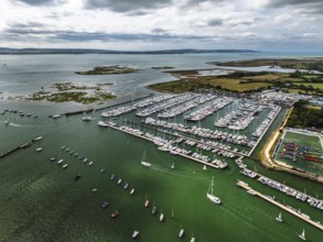 Lymington River and marina from drone, Lymington, New Forest, Hampshire, England, United Kingdom
