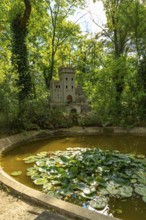 Water lily pond with bee castle in the spa gardens of Baden, Lower Austria, Austria