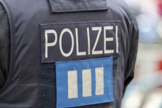 Symbolic image police operation: close-up of a police officer on duty