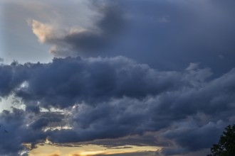 Rain clouds (Nimbostratus) in the evening, Bavaria, Germany
