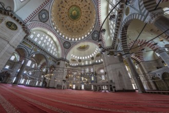 Wide angle view of the suleymaniye mosque interior in istanbul, turkey, showing the vastness of the