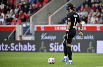 Goalkeeper Kamil Grabara VfL Wolfsburg (01) with face mask Carbon mask Action Voith-Arena,