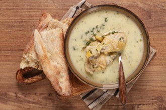 Chikhirtma chicken soup, Georgian dish, with lavash, top view, no people