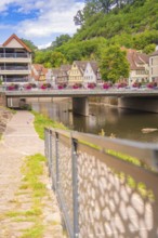 Modernised bridge over a river in an urban setting on a summer's day, small town of Perle Calw,