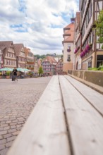 Half-timbered houses from an unusual perspective with a view of the sky, small town of Perle Calw,