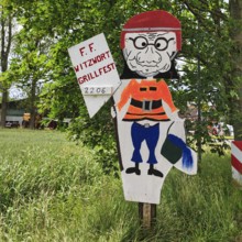 Funny sign with fireman figure and water bucket, inscription, invitation to barbecue, volunteer