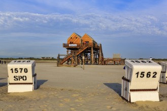 Pile dwelling, toilet house on the beach, beach chairs, Sankt Peter-Ording, Eiderstedt peninsula,