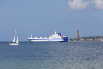 Sailing boat, cargo ship, naval memorial, Laboe, Kiel Fjord, Schleswig-Holstein, Germany