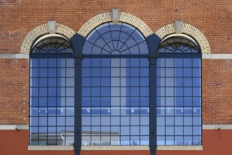 Former factory windows of a brewery boiler house, today artist Stefan Schrumbel's studio,
