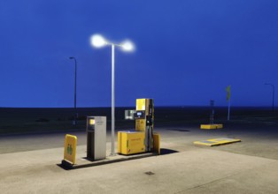 Petrol station vending machine with self-service day and night in rural surroundings in the