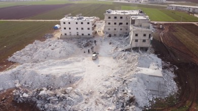 An aerial view shows the destruction of homes caused by the powerful earthquake that struck Turkey