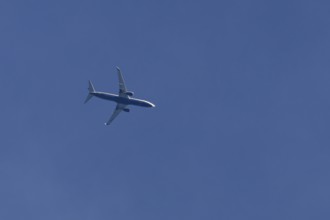 Boeing 737 jet passenger aircraft of Ryanair airlines flying in a blue sky, England, United Kingdom