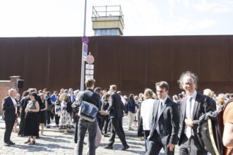 Visitors after a wreath-laying ceremony to commemorate the division of the city from 13 August 1961