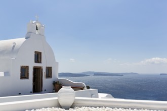 White architecture, orthodox church by the sea, Oia, Santorini, Cyclades, Aegean Sea, Greece