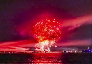 Lake Night Festival Constance. Water fireworks over the German shore and the neighbouring Swiss
