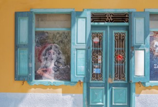 Painted outdoor cafe window, Gialos, Symi Island, Dodecanese Islands, Greece