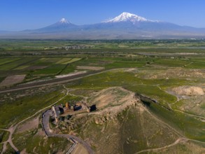 Archaeological site on a hill with sweeping views of the mountains, aerial view, Chor Wirap