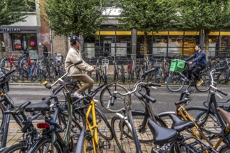 Ride your bike in the city centre of Groningen, old town, designated areas where bikes may be