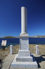 Monument, Hippolyte Bisson, A tall white column stands under a blue sky overlooking the sea,