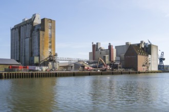 Grain silos, warehouses, land trade, outer harbour, Husum, North Frisia, North Sea,
