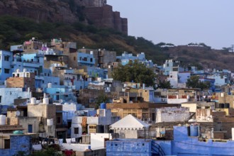 Mehrangarh Fort, above colourful houses, Blue City, Gulab Sagar, Jodhpur, Rajasthan, India