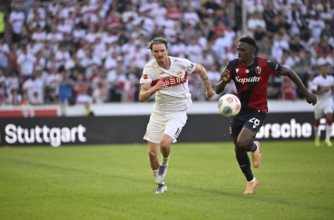 Duel, action Jhon Lucumi FC Bologna (26) against Nick Woltemade VfB Stuttgart (11) MHP Arena