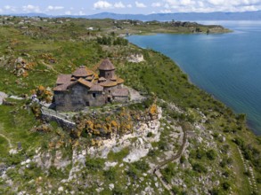 Church perched above a magnificent lake with a panoramic view of the surrounding countryside,