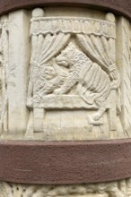 Stone relief half relief motif on fairy tale fountain from fairy tale Little Red Riding Hood and