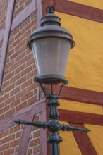 Old street lamp at a half-timbered house in Ystad, Skåne county, Sweden, Scandinavie