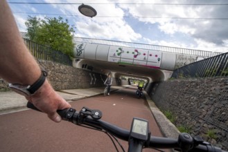 Rijnwaalpad long-distance cycle path, near the village of Elst, subway of the A15 motorway, wide