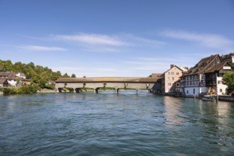 The historic wooden bridge over the Rhine was opened in 1816 and connects the German municipality