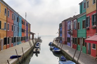 Boats on the canal, typical street scene in winter, colourful facades, various fishermen's houses