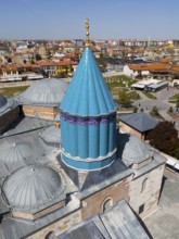 Close-up of a blue dome with elaborate mosaics in the centre of the city, aerial view, Mevlânâ