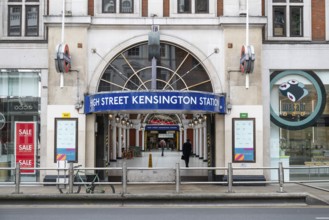 Entrance to High Street Kensington underground station in an urban environment, Kensington, London,