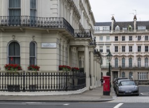 Urban scene with neoclassical buildings, Prince of Wales Terrace, Kensington, London, England,