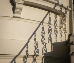 Shadow of an artistically decorated banister on a house wall, Notting Hill, London, England, Great